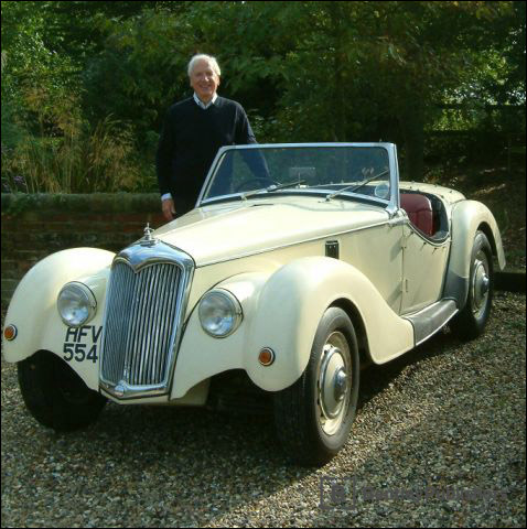 Karl Ludvigsen with his 1953 Riley 2.5L that was specially modified as a two-seater sports car in Scotland by Dennis Ramsay.