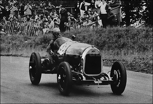 Racing a Vintage Car: Nigel Arnold-Foster racing his 1922 5,136 c.c. Delage during a Vintage Sports-Club race meeting at Oulton Park.