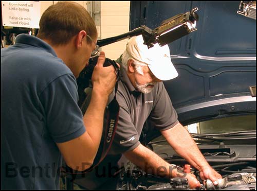 Bentley technical editors removing Valvetronic motor on N51 engine.