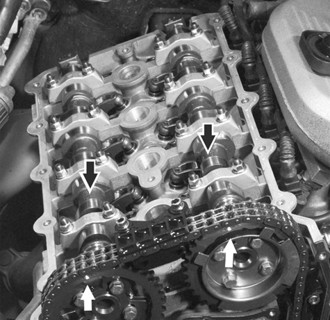 Engine and cylinder head service, including VANOS timing chain setup and adjustment.
117 Camshaft Timing Chain
page 117-2