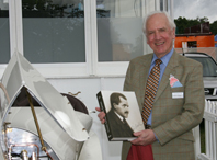 Karl Ludvigsen with a copy of Ferdinand Porsche - Genesis of Genius