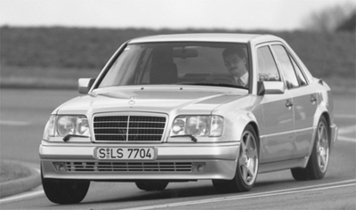 The 500E [E500 above] 32-valve 5.0 liter V-8 made 315 hp, went zero to sixty in less than six seconds and had a top speed of 150 mph (electronically limited).
The sport suspension package was telegraphed by flared fenders, 8 inch wheels, and 225/55-16 ZR tires.
Almost every option was standard equipment including a Sportline interior with four leather bucket seats. The 500E was fitted with a self-leveling rear suspension, ASR traction control, and dual airbags. Priced at $79,200 with an added $2,600 gas guzzler tax, the 500E was the ultra-high-performance 4-door sedan.
Chapter 1: Introduction to the E-Class
page 21