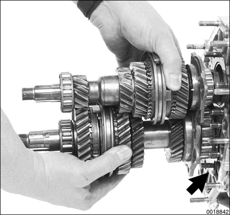 Step by step instruction with detailed photographs of transmission disassembly and assembly.
340 Manual Transmission-Controls and Case
page 340-15